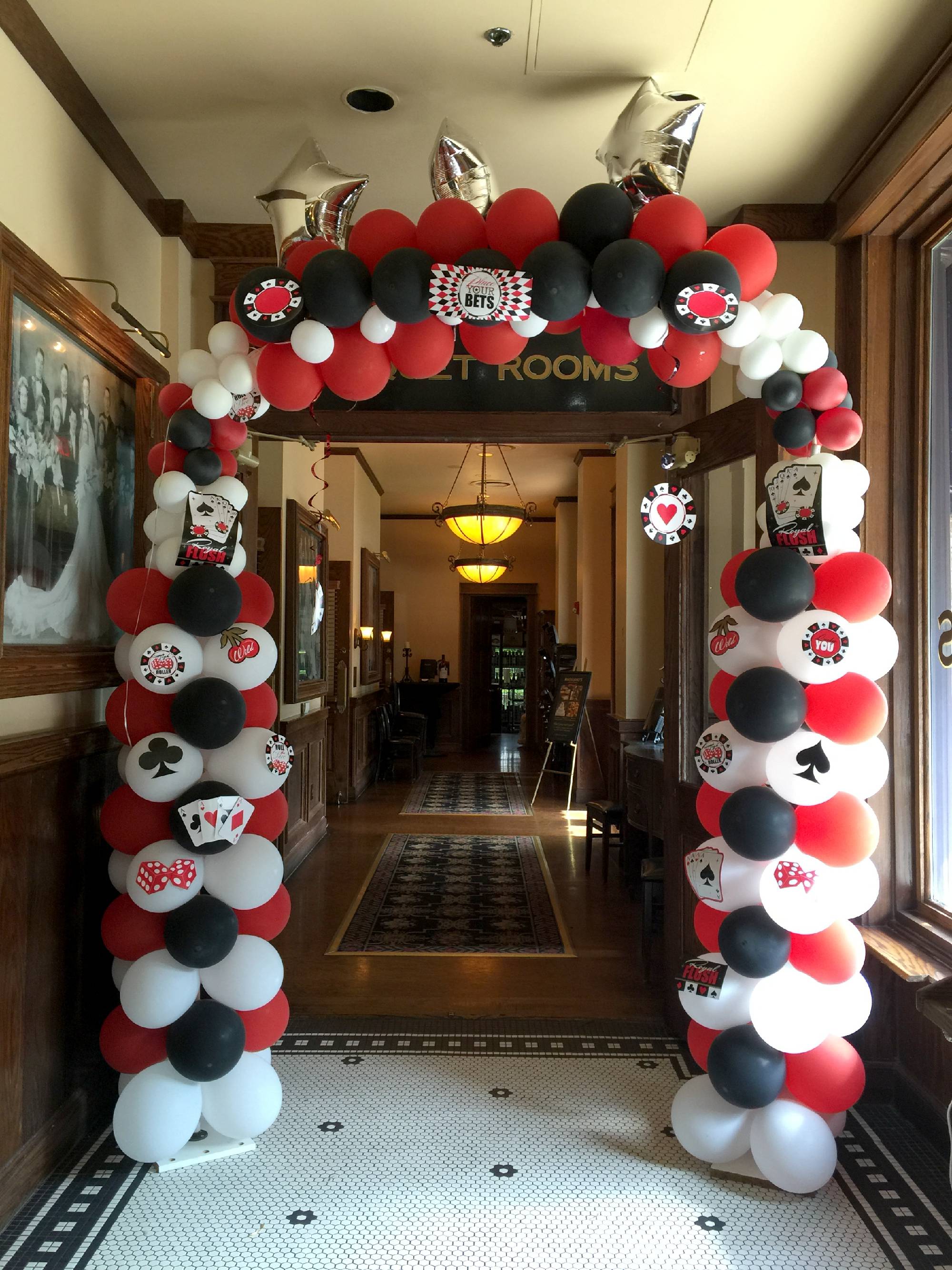 Poker night balloon arch